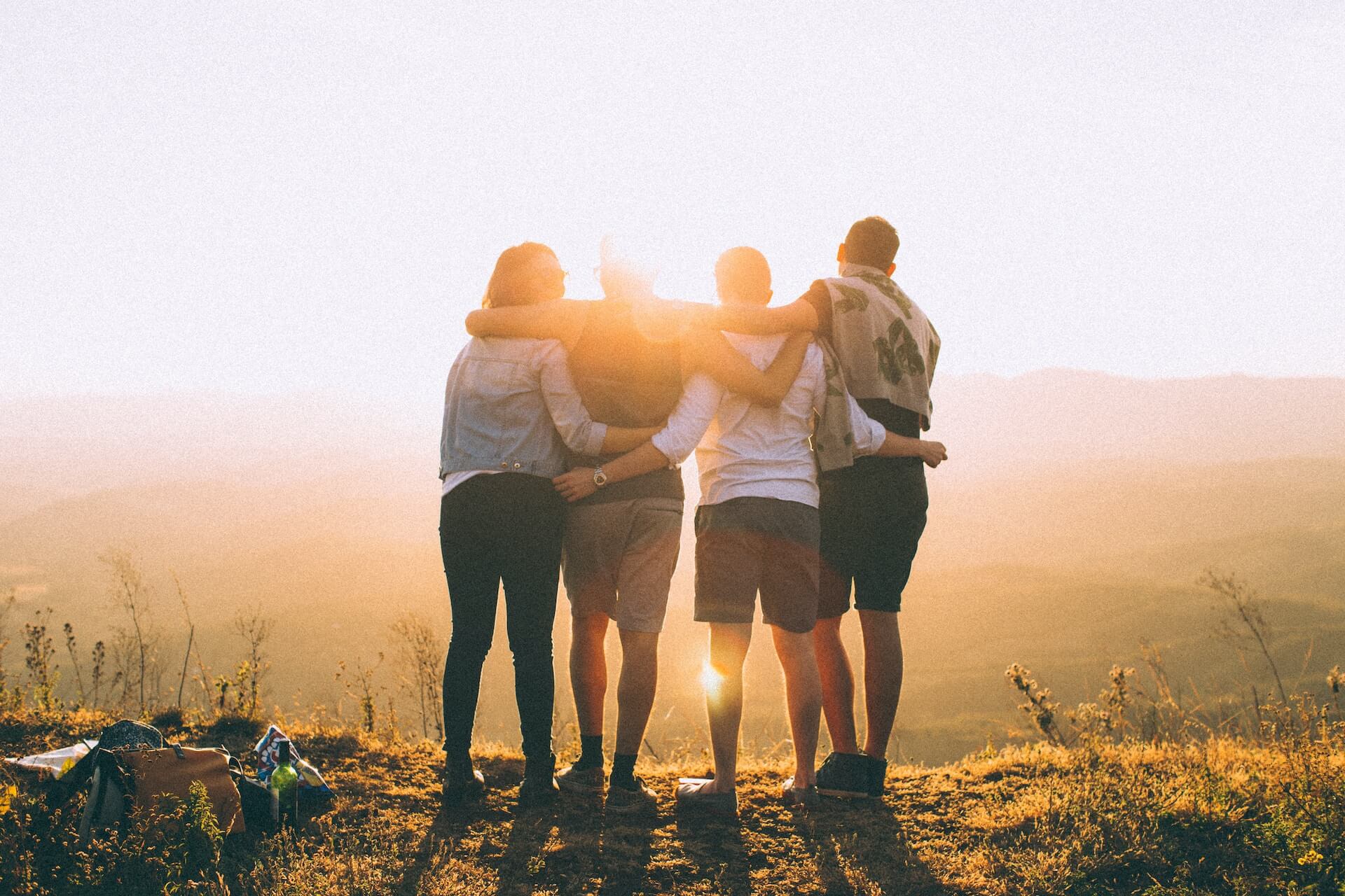 a man standing with his friends