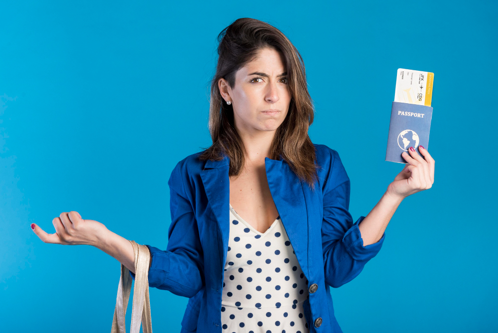 a woman holding a passport showing doubts