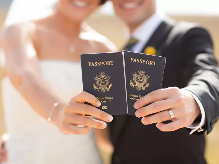 a couple holding US passports