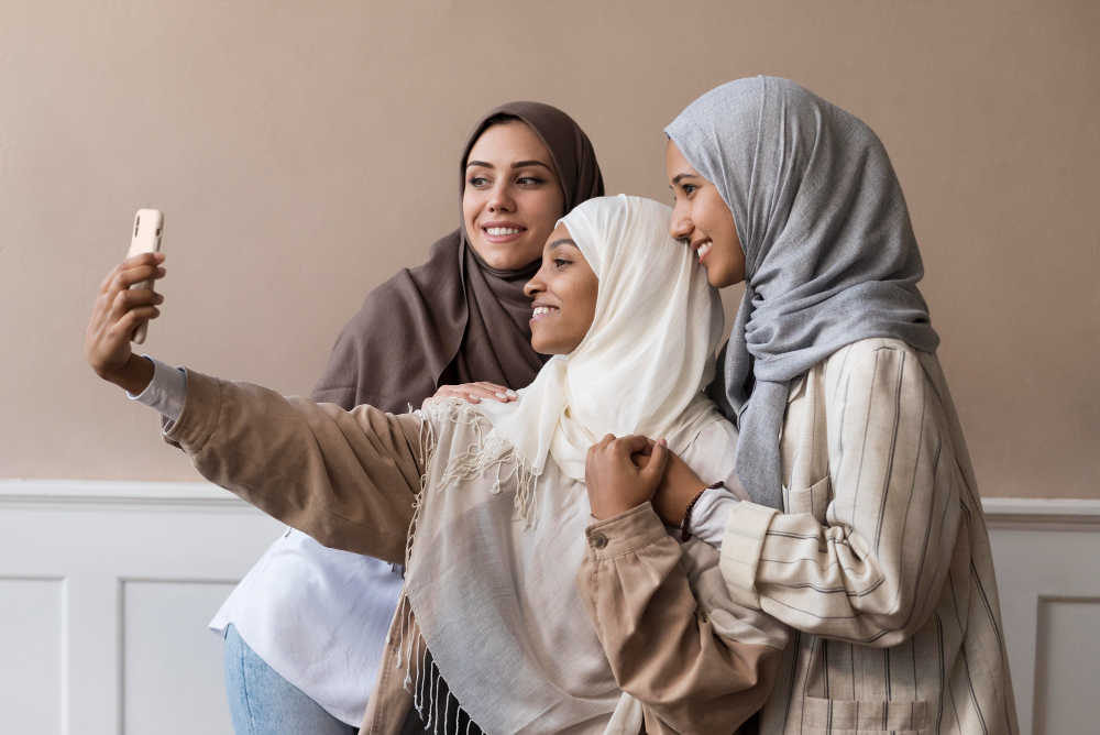 medium shot women taking selfie